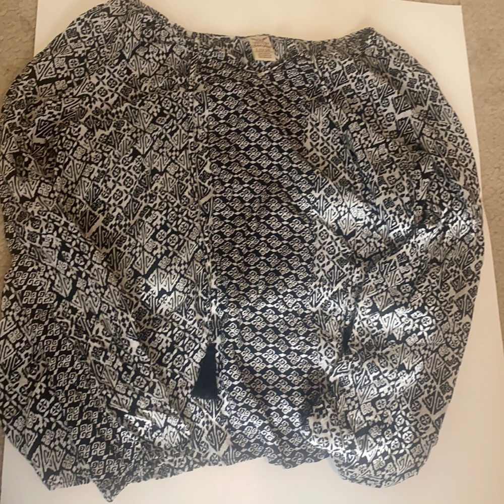 Patterned long sleeve with tassels